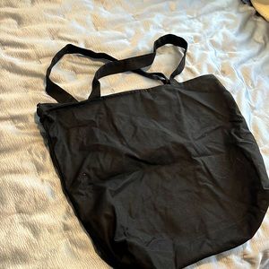 Plain black zip tote.